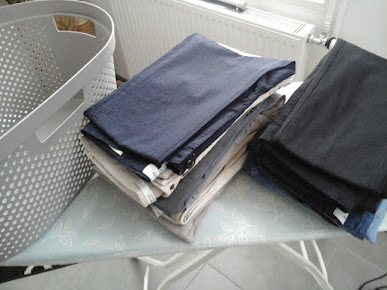 Drap bien lisse sur table à repasser